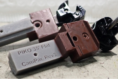 Piko_ATSF_35footFlatCarPaintedlRedRev3CamPacBoxesProcessed_PB270001